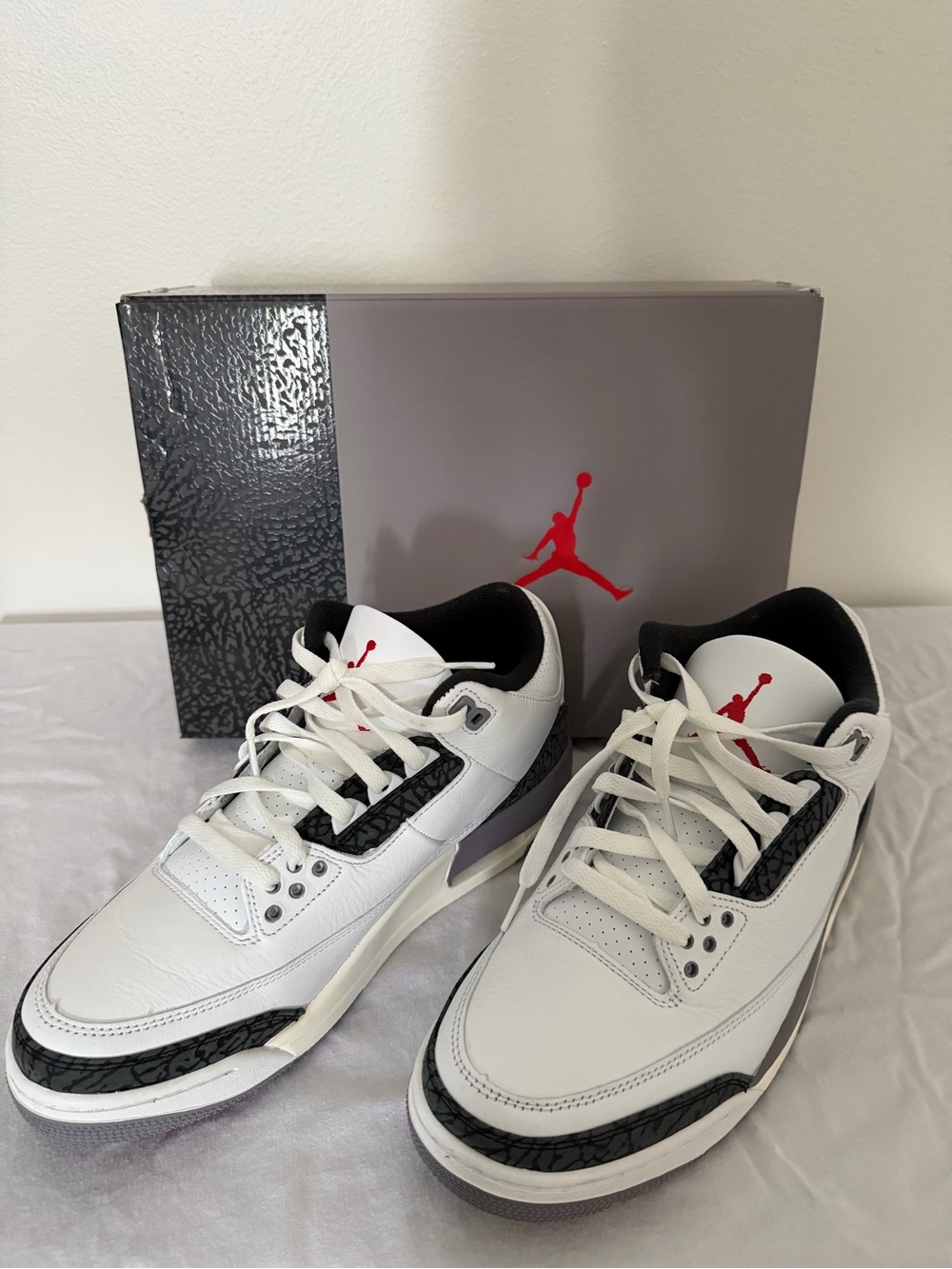 Jordan Men’s White, Black and Red Retro Low Top Sneakers